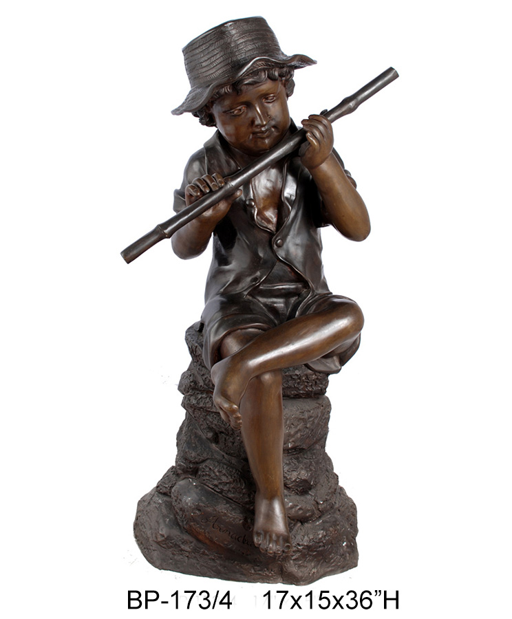 Boy sitting on Rock with Flute